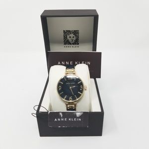 Anne Klein Womens MOP Dial Bangle Bracelet Watch